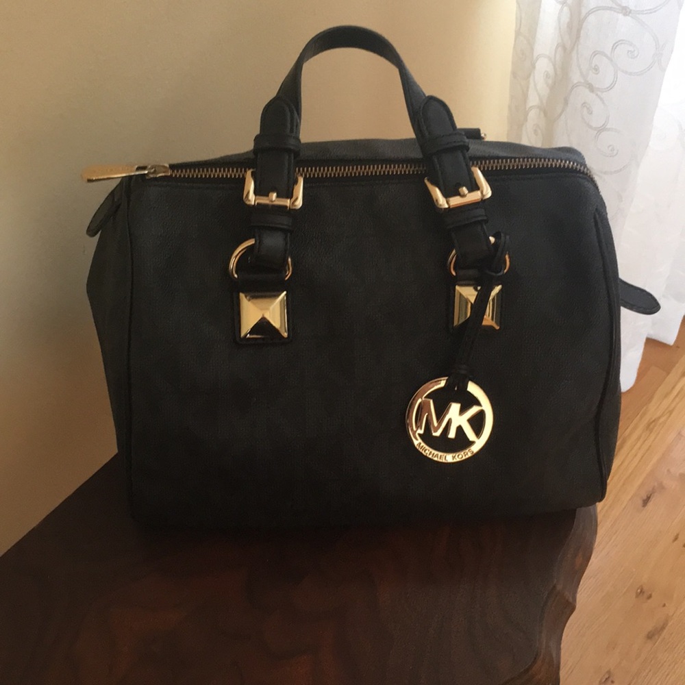 Michael Kors black and gold purse